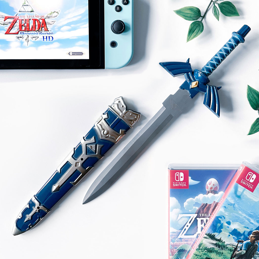 Immagine del prodotto Replica in miniatura della Master Sword con fodero per fan di Zelda