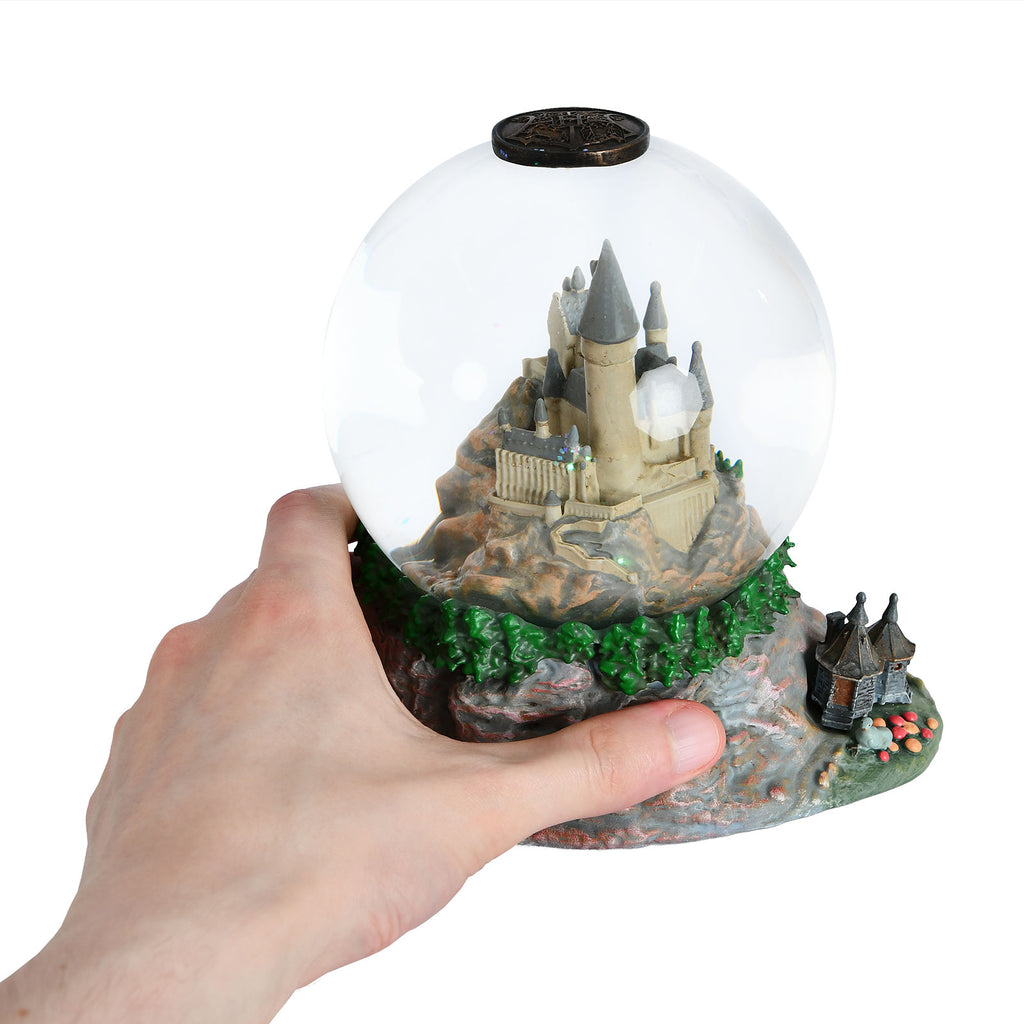 Immagine del prodotto Harry Potter - Hogwarts con la capanna di Hagrid Globo di neve con glitter