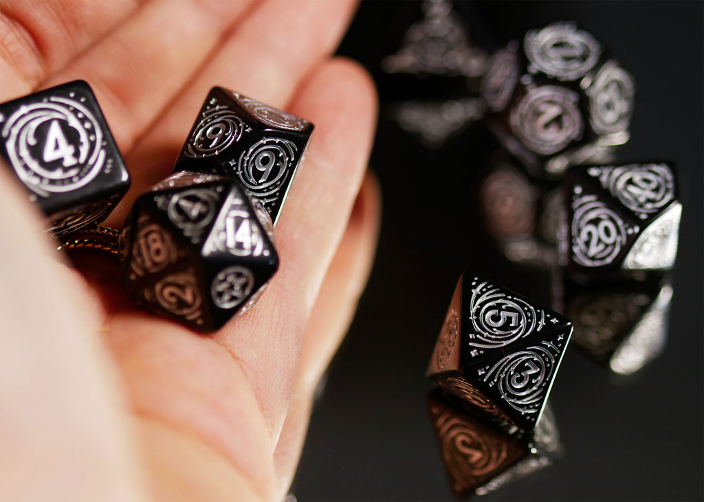 Immagine del prodotto Witcher - Yennefer Obsidian Star RPG Set di Dadi 7 pezzi con Moneta da Collezione