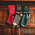 Immagine del prodotto Set di 3 calzini Hogwarts in scatola regalo - Harry Potter