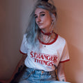 Immagine del prodotto Stranger Things - Crop top con logo distressed bianco