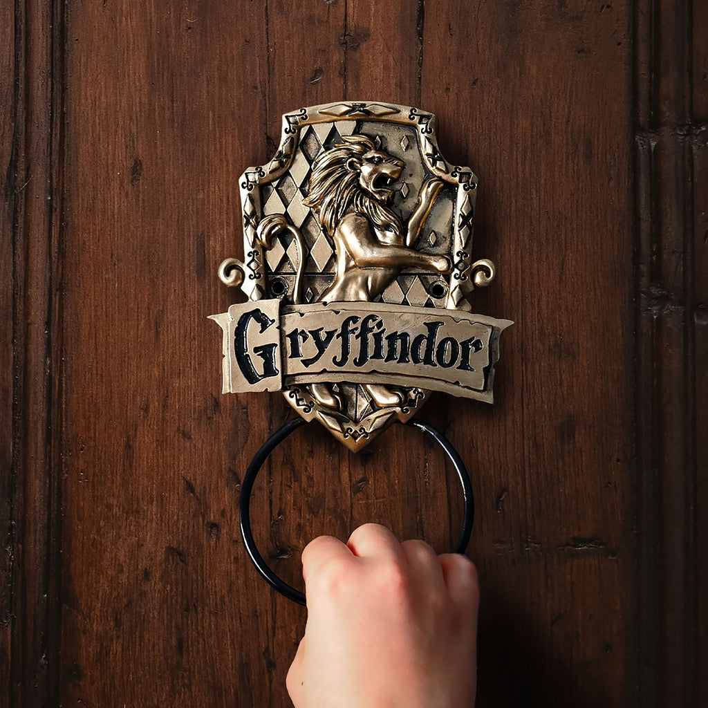 Immagine del prodotto Harry Potter - Bussola da porta con lo stemma di Grifondoro