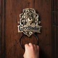 Immagine del prodotto Harry Potter - Bussola da porta con lo stemma di Grifondoro