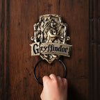 Immagine del prodotto Harry Potter - Bussola da porta con lo stemma di Grifondoro