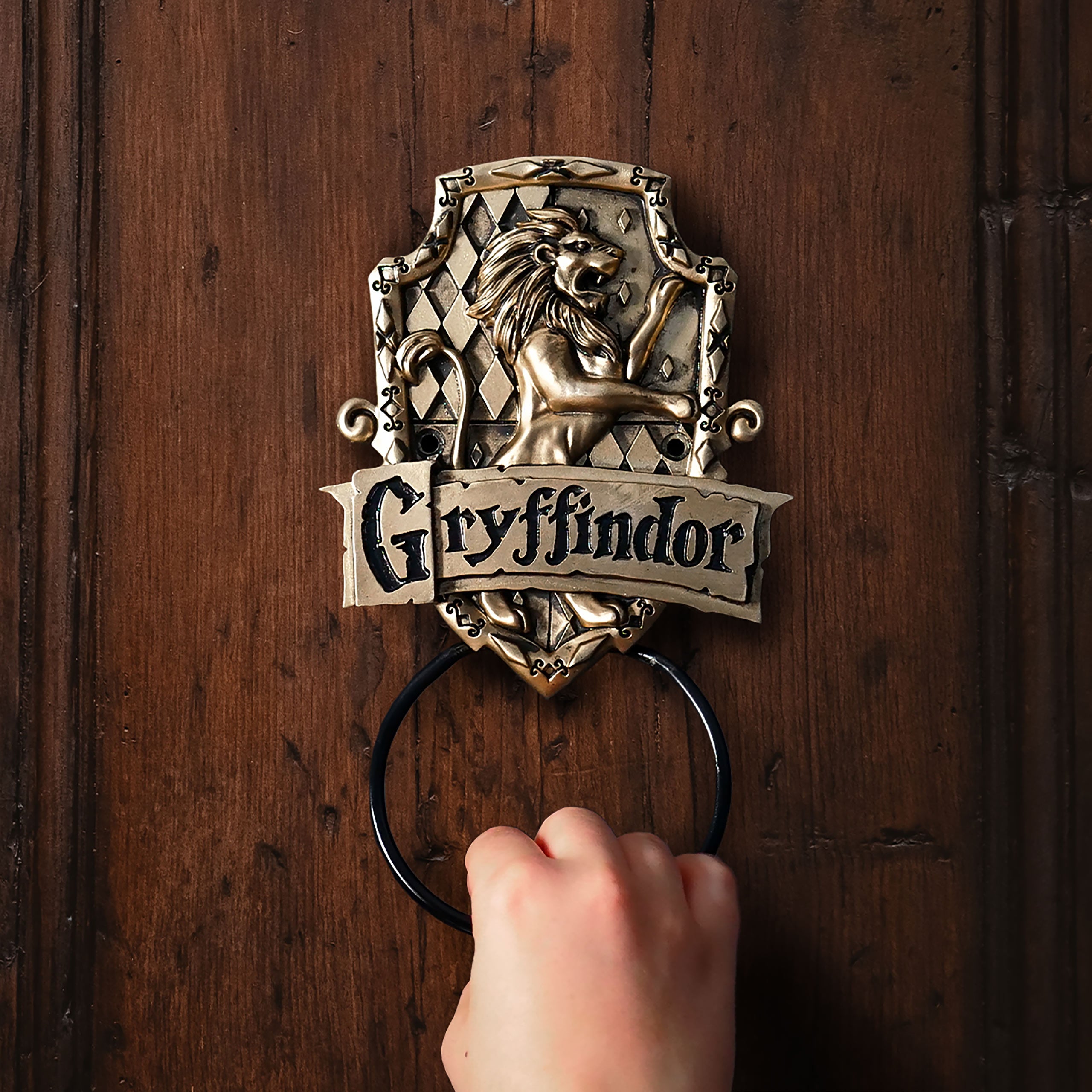 Immagine del prodotto Harry Potter - Bussola da porta con lo stemma di Grifondoro