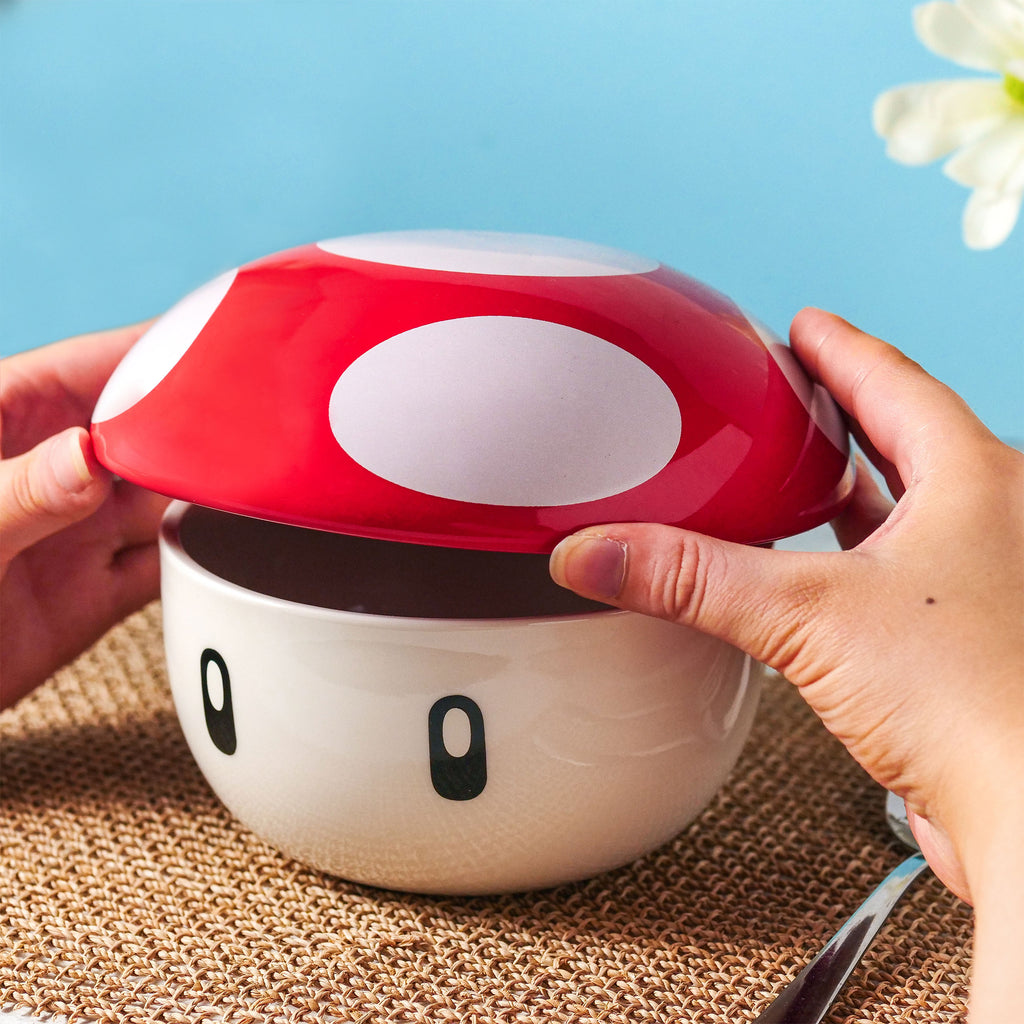 Immagine del prodotto Ciotola Super-Fungo con coperchio per fan di Super Mario