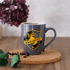 Immagine del prodotto Tazza grigia con logo Hufflepuff - Harry Potter