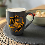 Immagine del prodotto Tazza grigia con logo Hufflepuff - Harry Potter