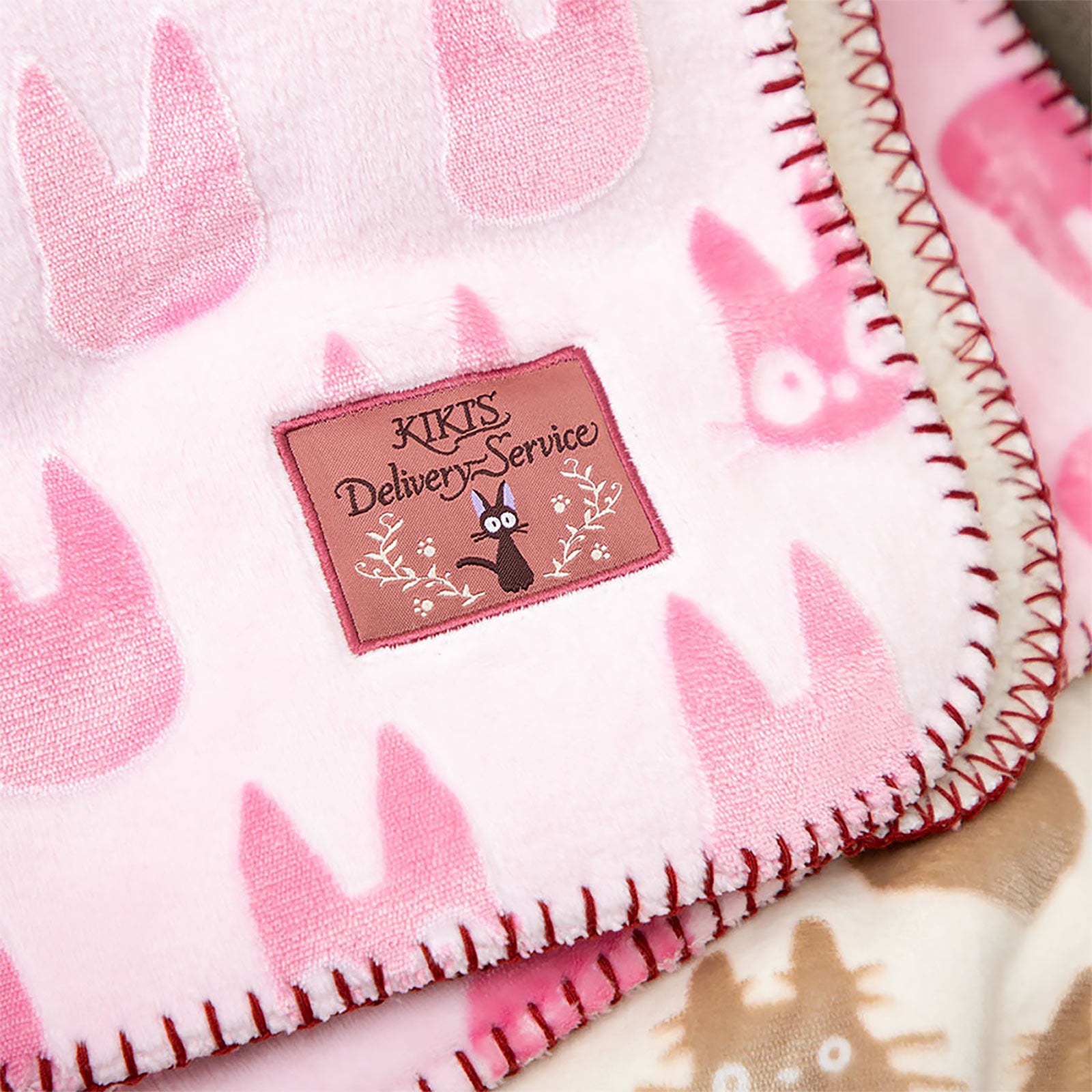 Immagine del prodotto Kiki - Consegne a domicilio - Coperta soffice silhouette Jiji con interno teddy