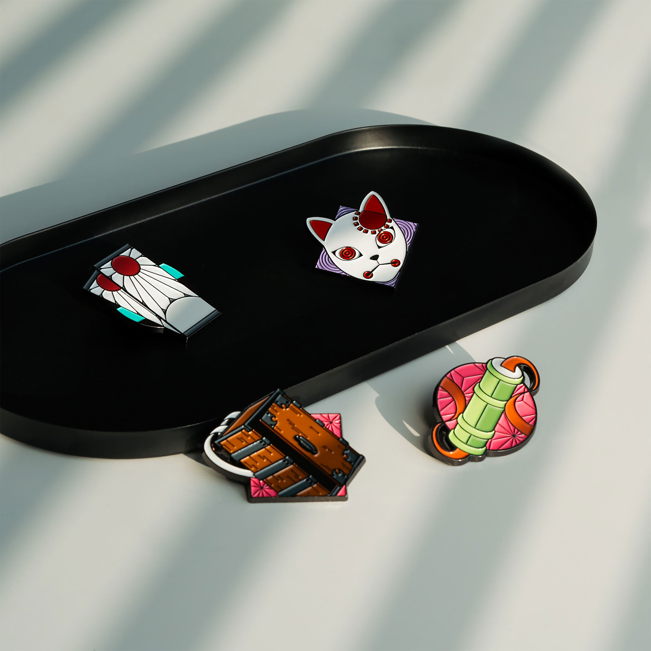 Immagine del prodotto Demon Slayer - Set di pin con simboli (4 pezzi)
