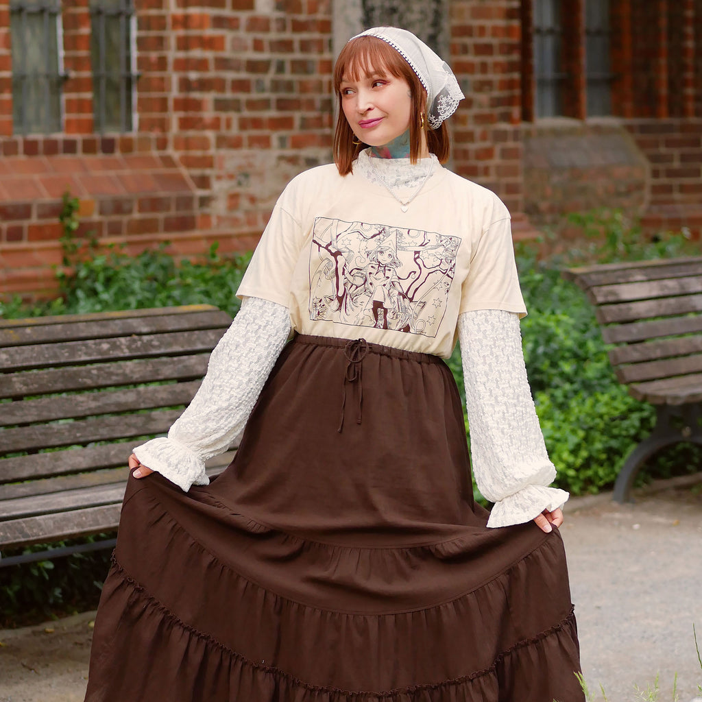 Immagine del prodotto T-shirt beige per fan di Coco e Atelier of Witch Hat
