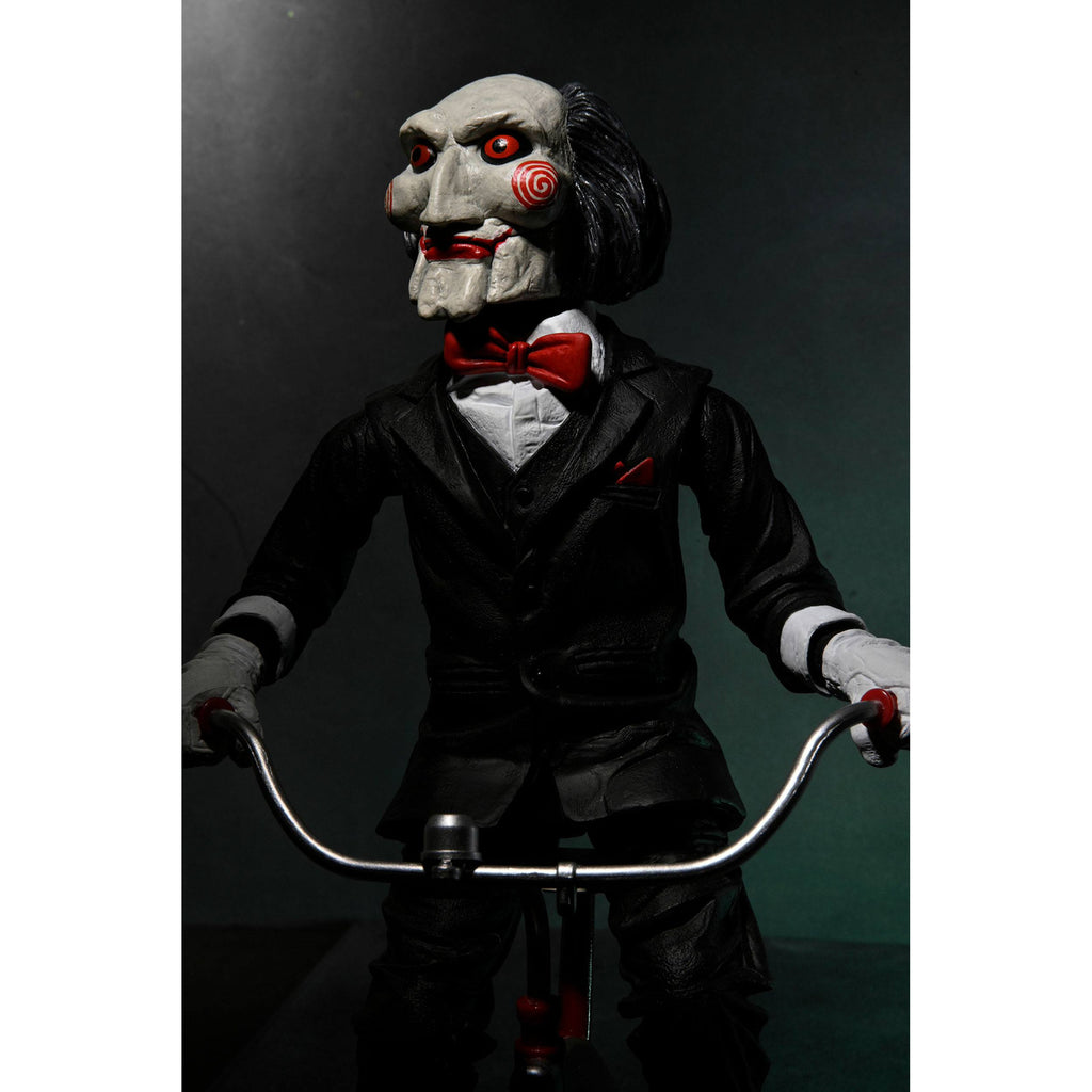 Immagine del prodotto Action figure Saw con suoni Billy con triciclo 30 cm