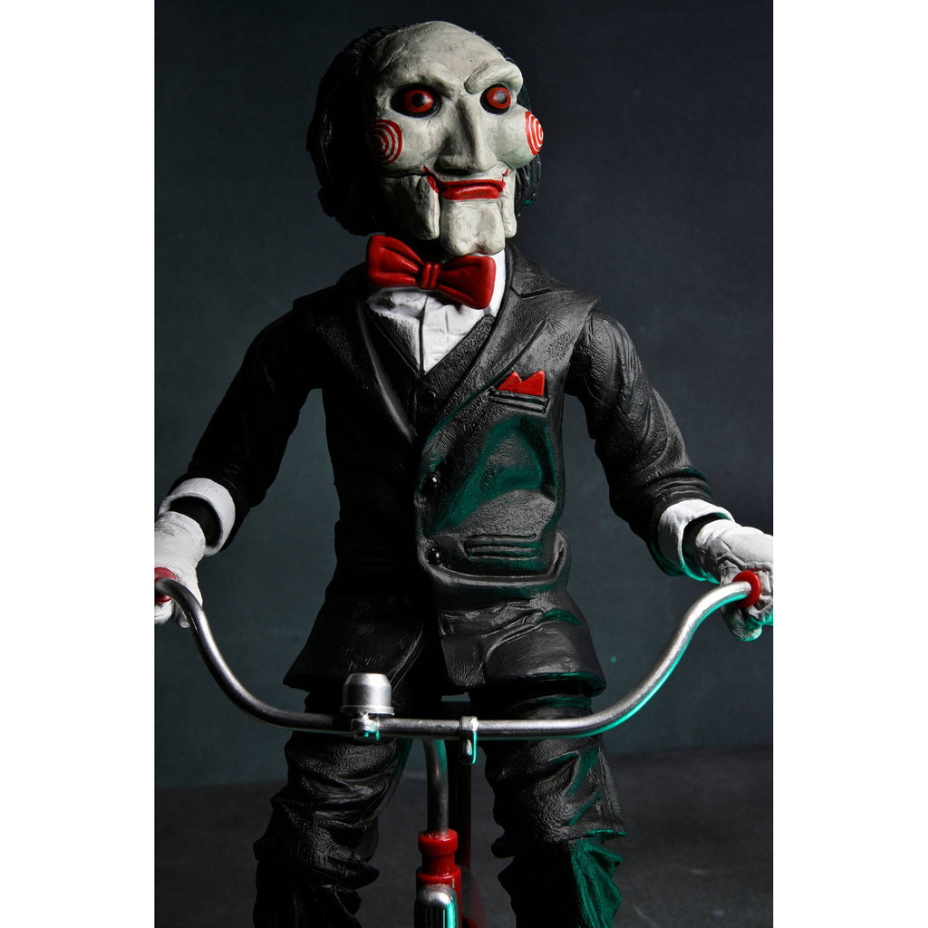 Immagine del prodotto Action figure Saw con suoni Billy con triciclo 30 cm