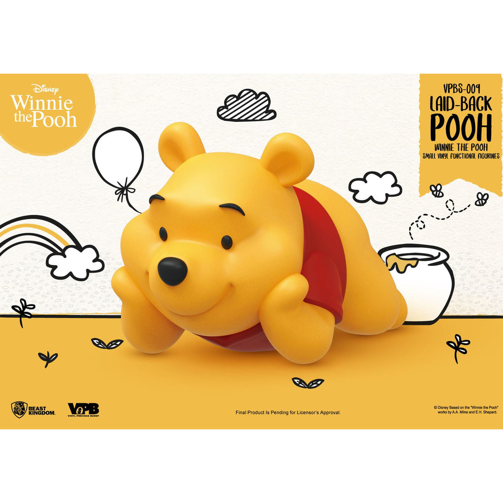 Immagine del prodotto Winnie the Pooh Piccolo salvadanaio in vinile Winnie sdraiato 17 cm
