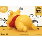 Immagine del prodotto Winnie the Pooh Piccolo salvadanaio in vinile Winnie sdraiato 17 cm